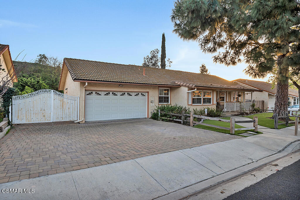 1278 Rambling Road Simi Valley, CA 93065 - Photo 62 of 76 a view of house with outdoor space and parking