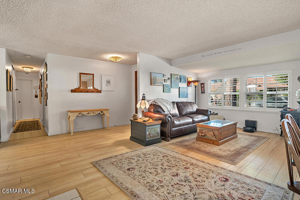 1278 Rambling Road Simi Valley, CA 93065 - Photo 10 of 76 a living room with furniture and a couch