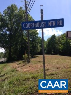 Courthouse Mountain Road Madison, VA 22727 - Photo 5 of 9 a street sign that is sitting in the middle of a park