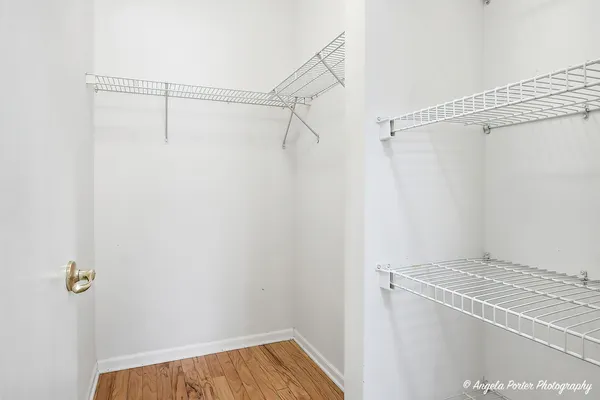 a view of a room with racks on the wall
