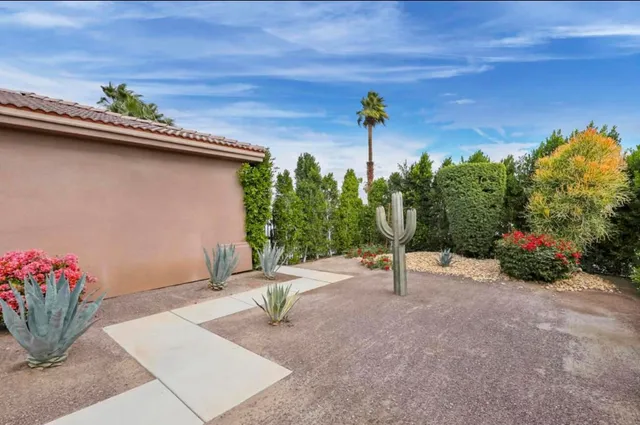 a view of an outdoor space and basketball court