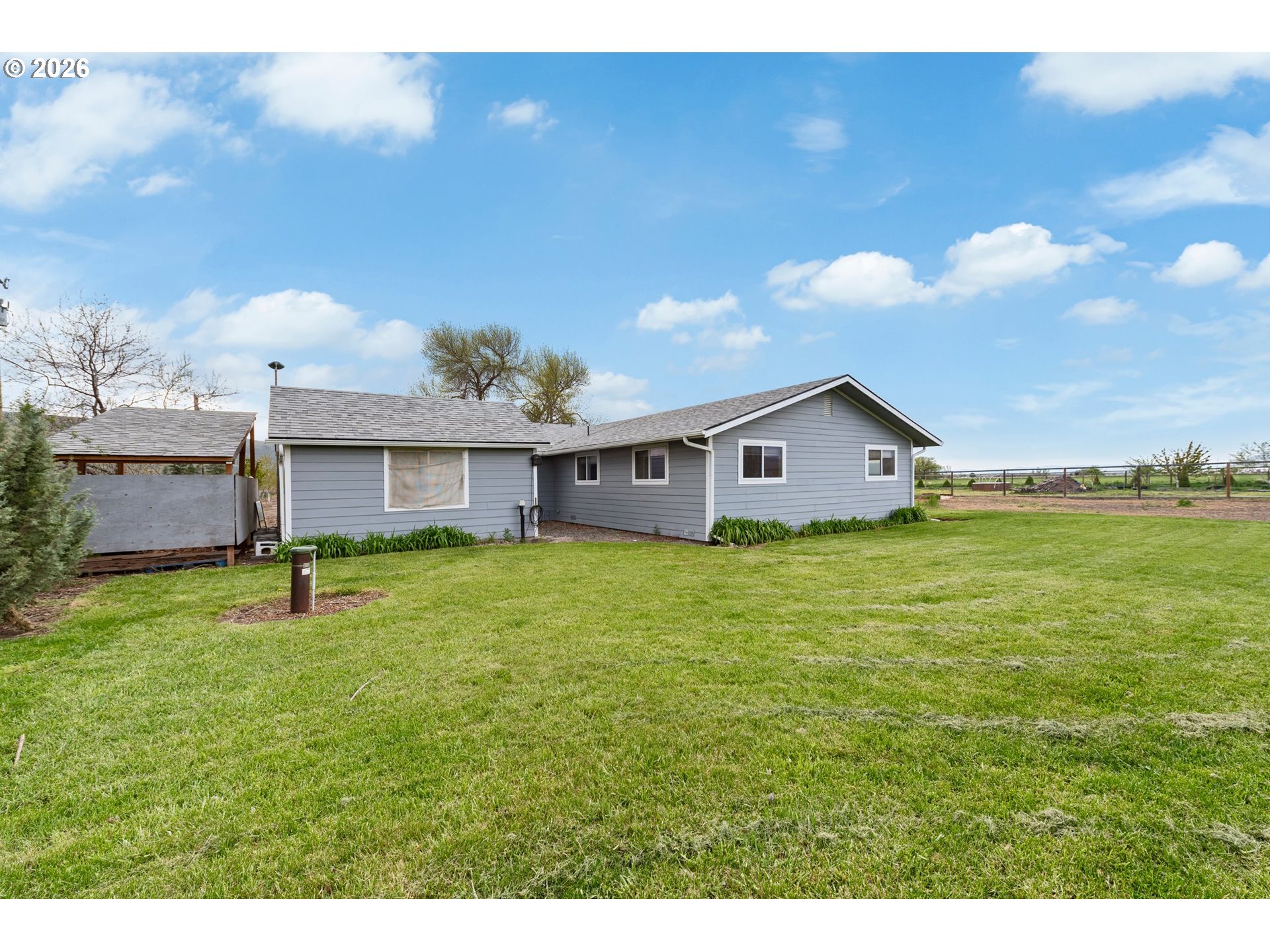 58015 Godley Road Union, OR 97883 - Photo 25 of 44 a view of a house with a backyard