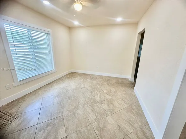 an empty room with a natural light
