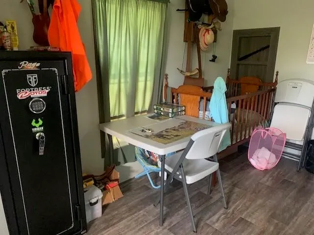 a table and chairs in a living room