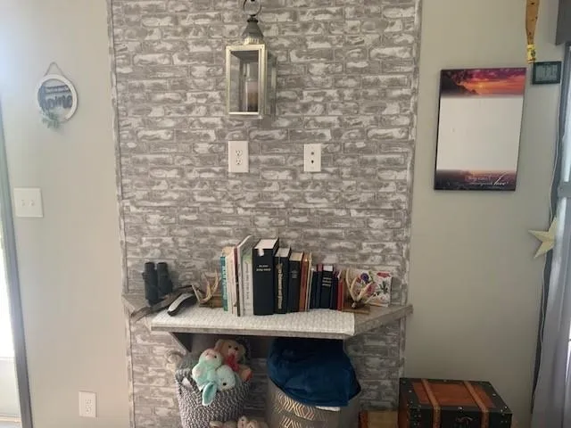 a close view of a sink and a table in a room