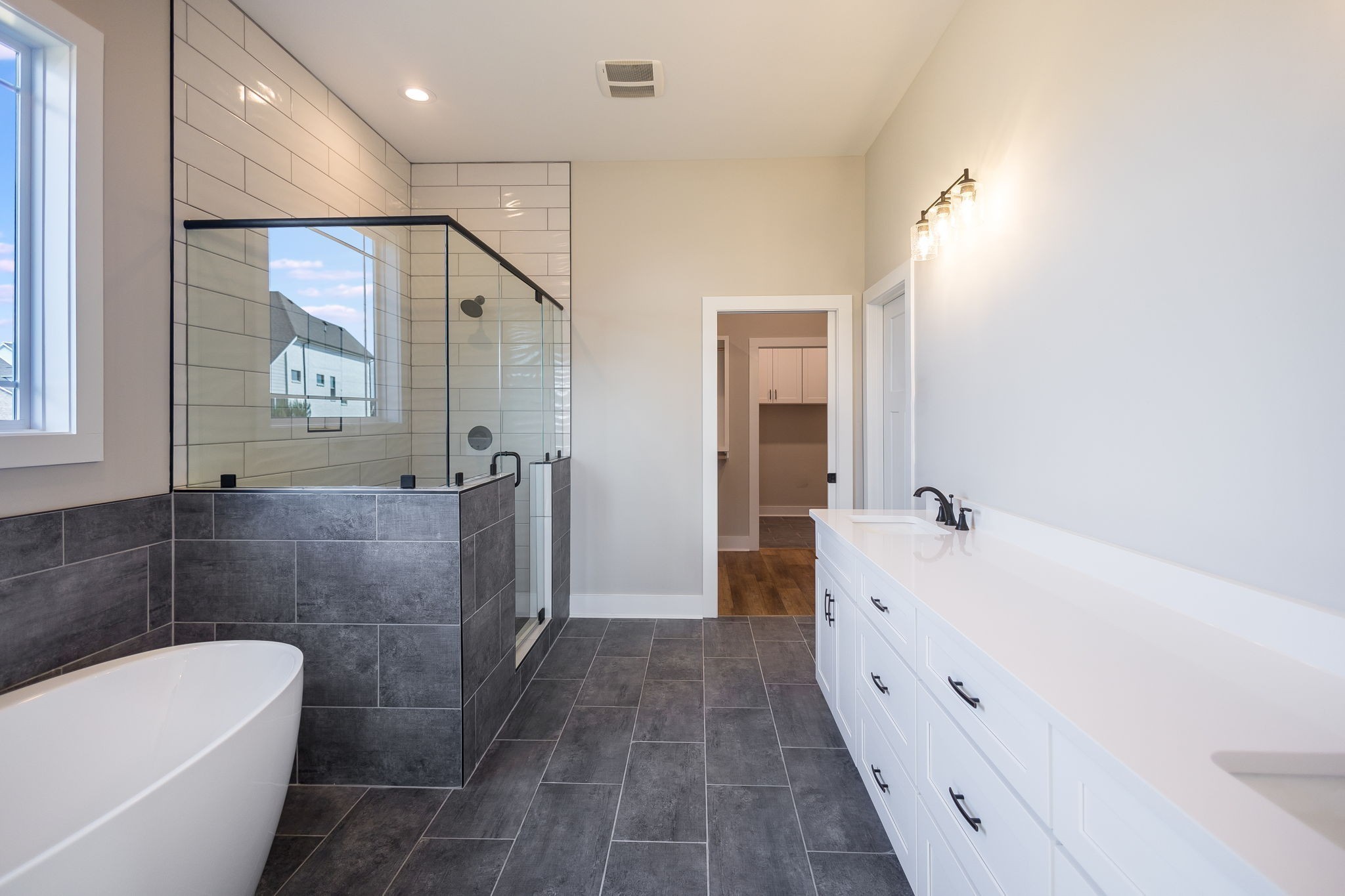 5708 Mullendore Court Murfreesboro, TN 37127 - Photo 22 of 47 a bathroom with a tub a toilet and a shower
