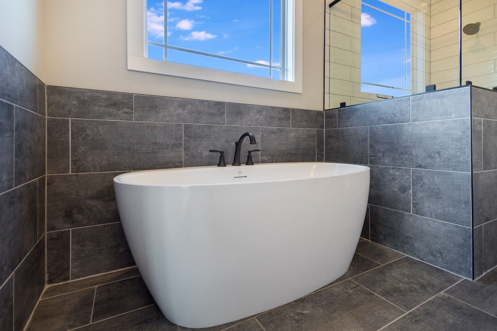 5708 Mullendore Court Murfreesboro, TN 37127 - Photo 25 of 47 a white bath tub sitting in a bathroom
