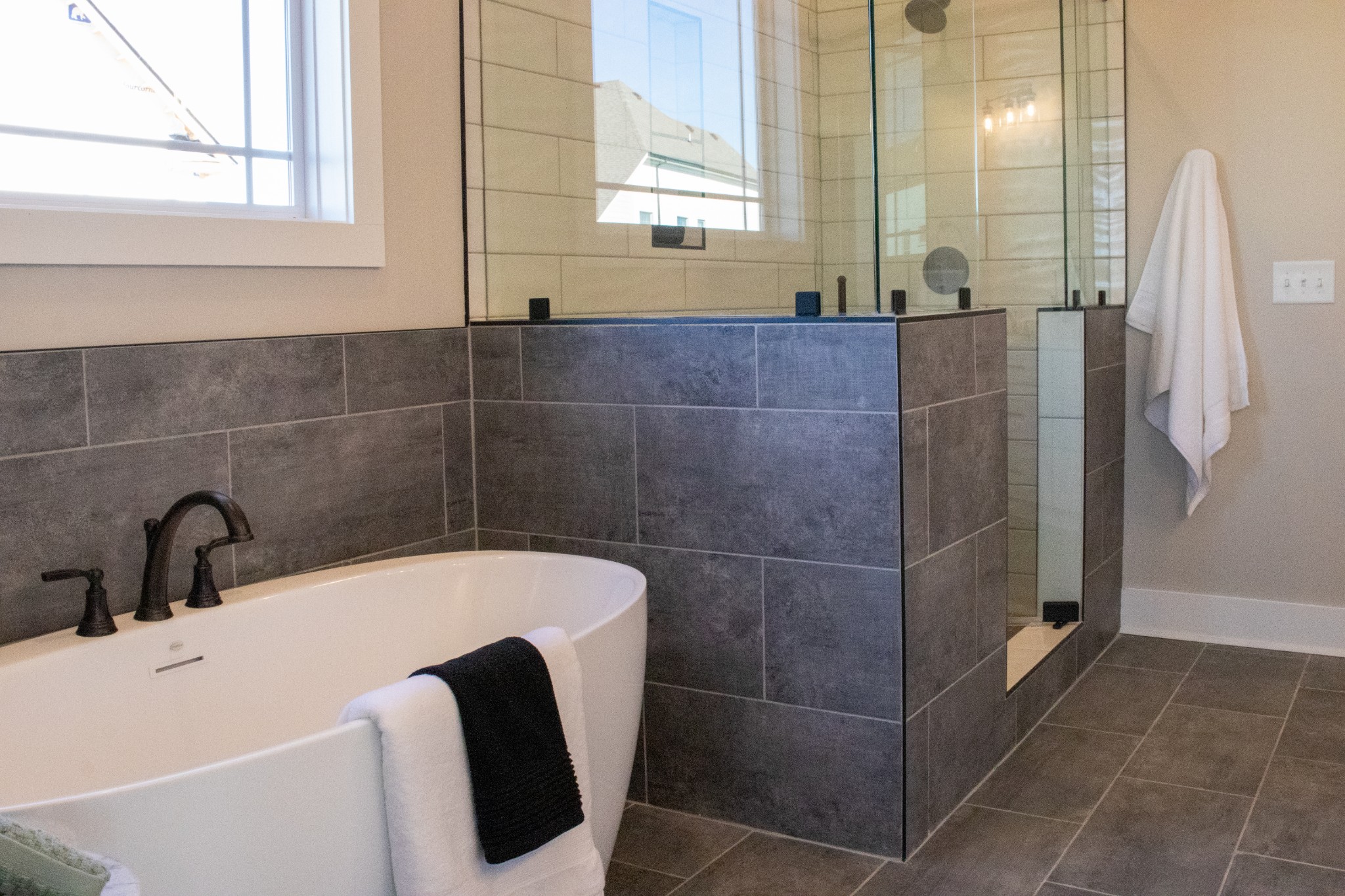 5708 Mullendore Court Murfreesboro, TN 37127 - Photo 26 of 47 a bathroom with a tub a sink and window