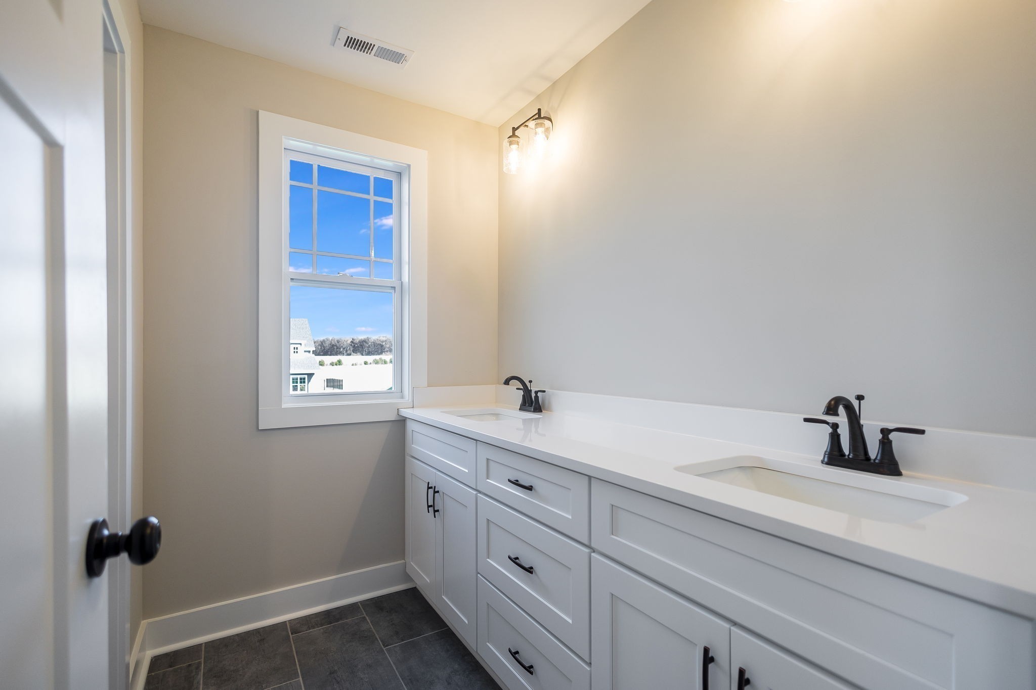 5708 Mullendore Court Murfreesboro, TN 37127 - Photo 36 of 47 a bathroom with a sink and mirror