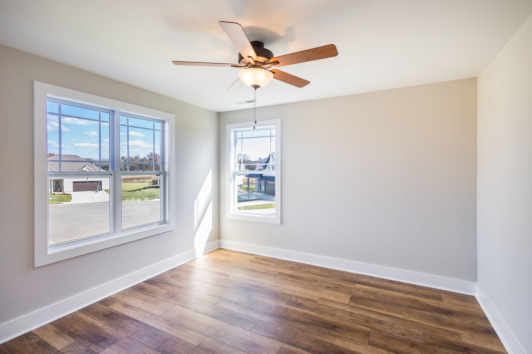 5708 Mullendore Court Murfreesboro, TN 37127 - Photo 38 of 47 a view of an empty room with wooden floor and a window