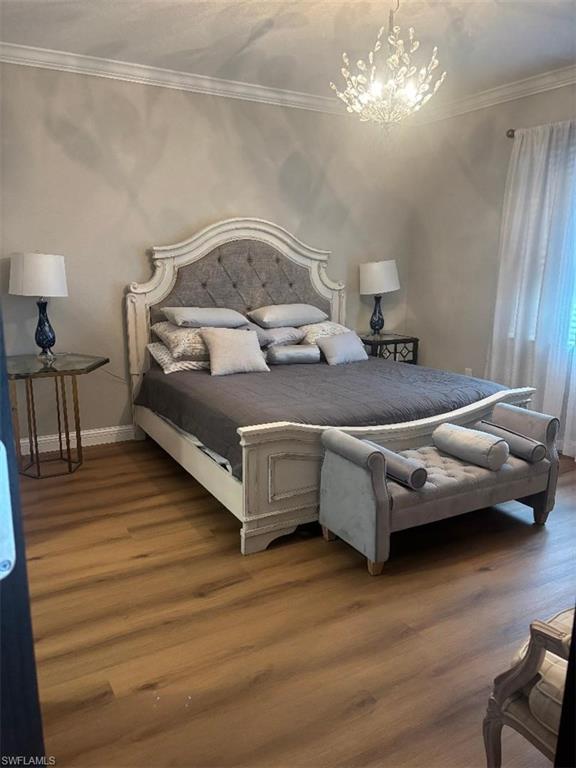 1599 Marton Court Naples, FL 34113 - Photo 12 of 25 Master king bed