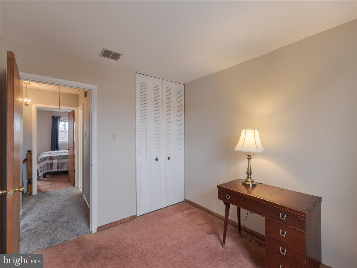 3249 Byberry Road Philadelphia, PA 19154 - Photo 20 of 28 a view of a room with a lamp and a workspace