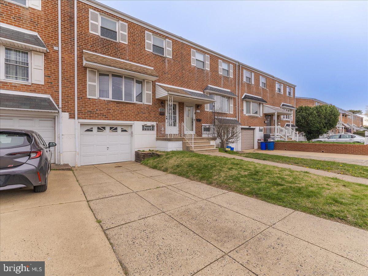 3249 Byberry Road Philadelphia, PA 19154 - Photo 3 of 28 a front view of a building with garden