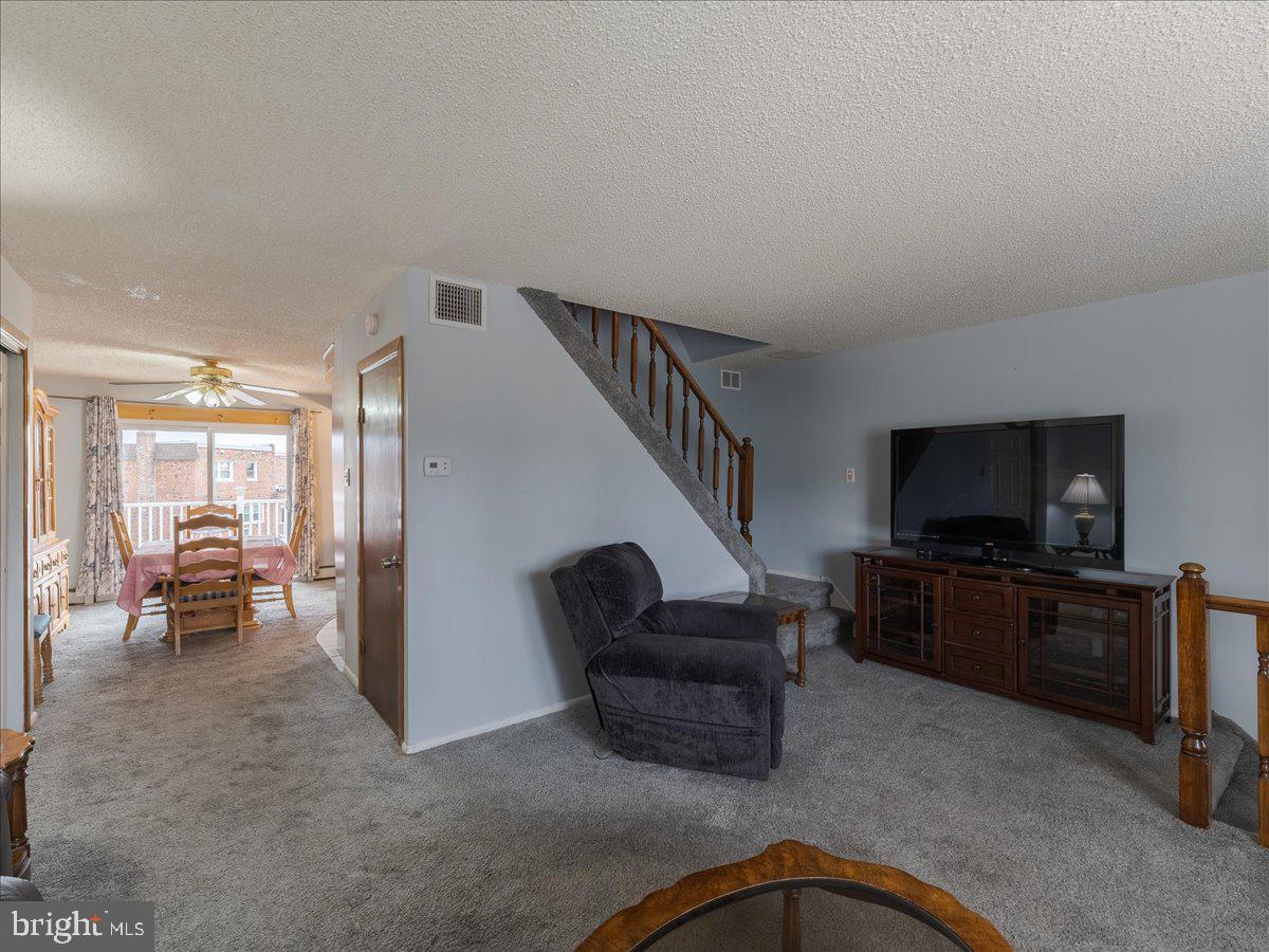 3249 Byberry Road Philadelphia, PA 19154 - Photo 7 of 28 a living room with furniture and a flat screen tv