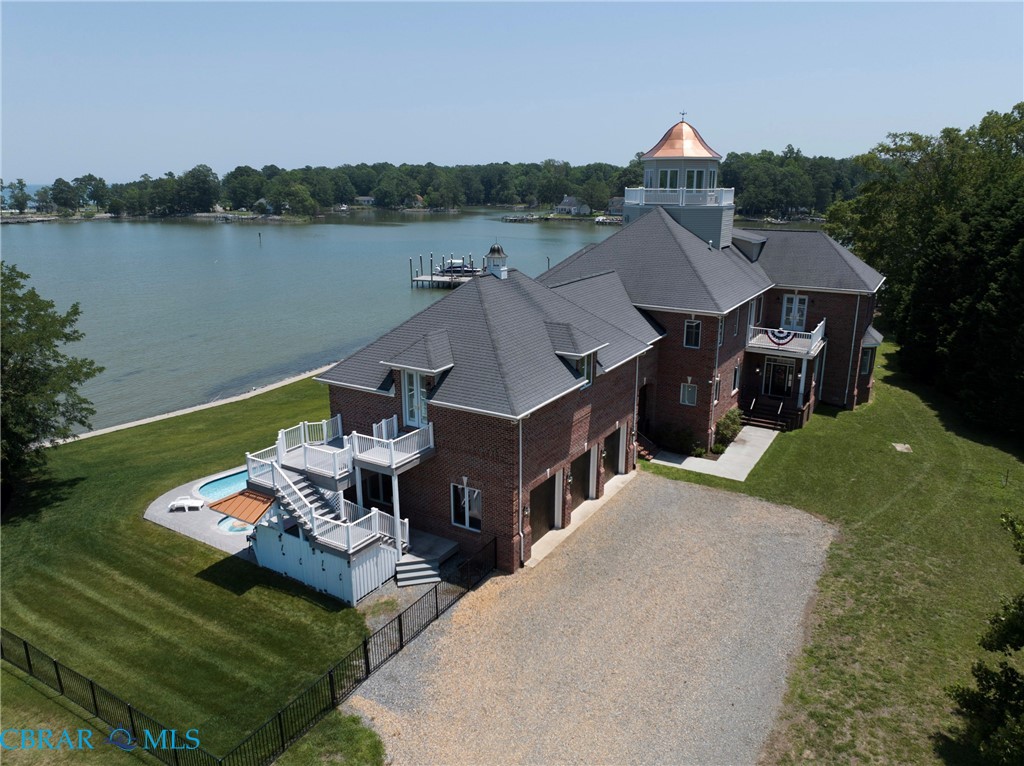 2106 Clarketown Road Heathsville, VA 22473 - Photo 3 of 56 a view of a house with pool and chairs