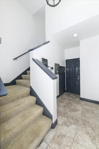 a view of entryway and kitchen