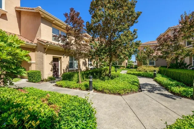 a view of a building with a yard