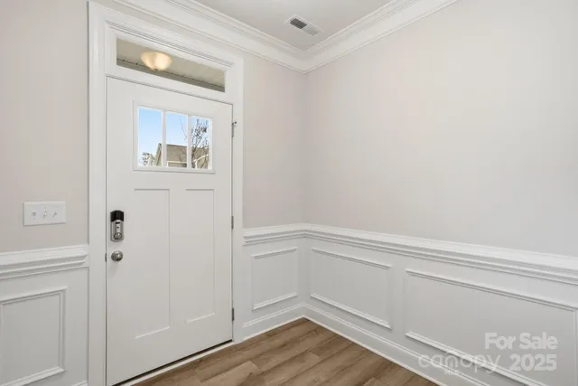 a view of a bathroom from the hallway