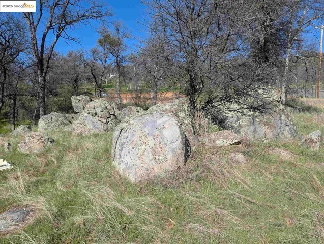 a view of a wooden fence of a house