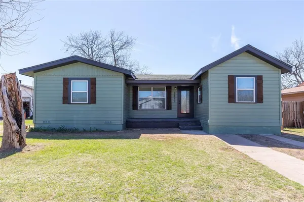 a view of a house of a house with a yard