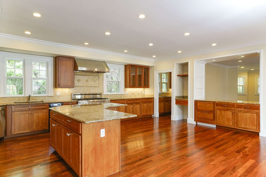 2 Hampton Road Lexington, MA 02421 - Photo 11 of 30 a large kitchen with stainless steel appliances granite countertop a large counter top and sink