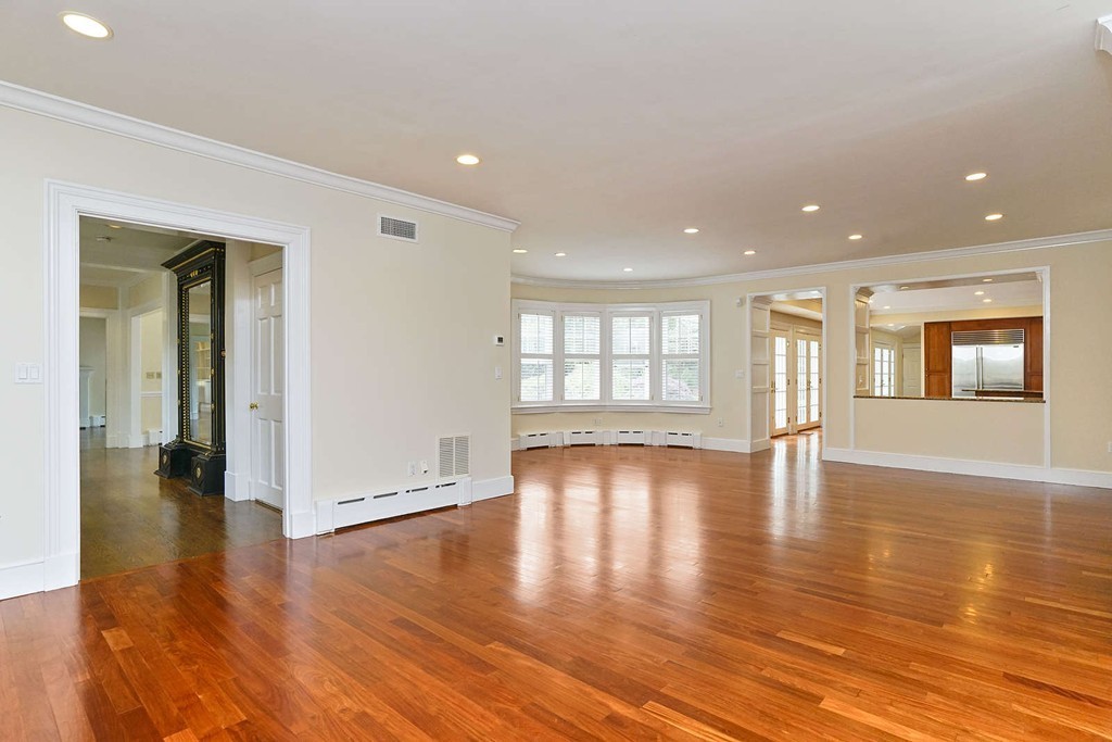 2 Hampton Road Lexington, MA 02421 - Photo 14 of 30 a view of an empty room with wooden floor and a window