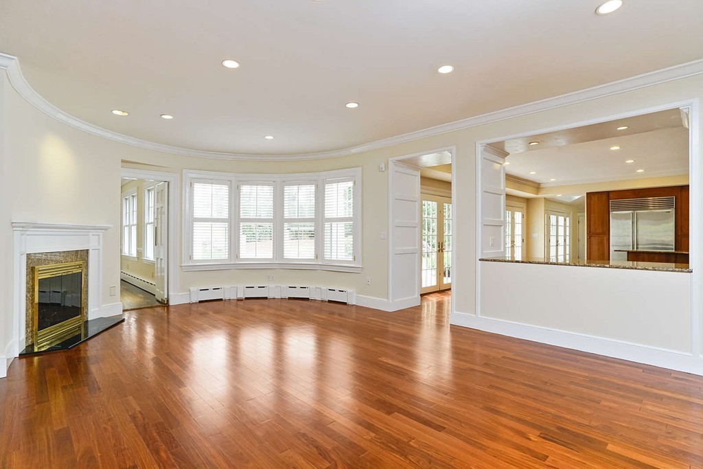 2 Hampton Road Lexington, MA 02421 - Photo 15 of 30 a view of an empty room with wooden floor and a window