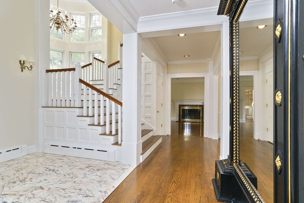 2 Hampton Road Lexington, MA 02421 - Photo 17 of 30 a view of a hallway with wooden floor and staircase