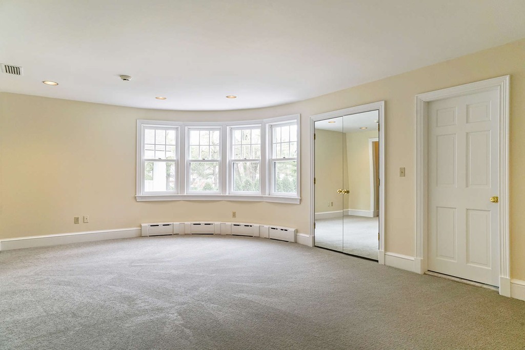 2 Hampton Road Lexington, MA 02421 - Photo 24 of 30 an empty room with windows