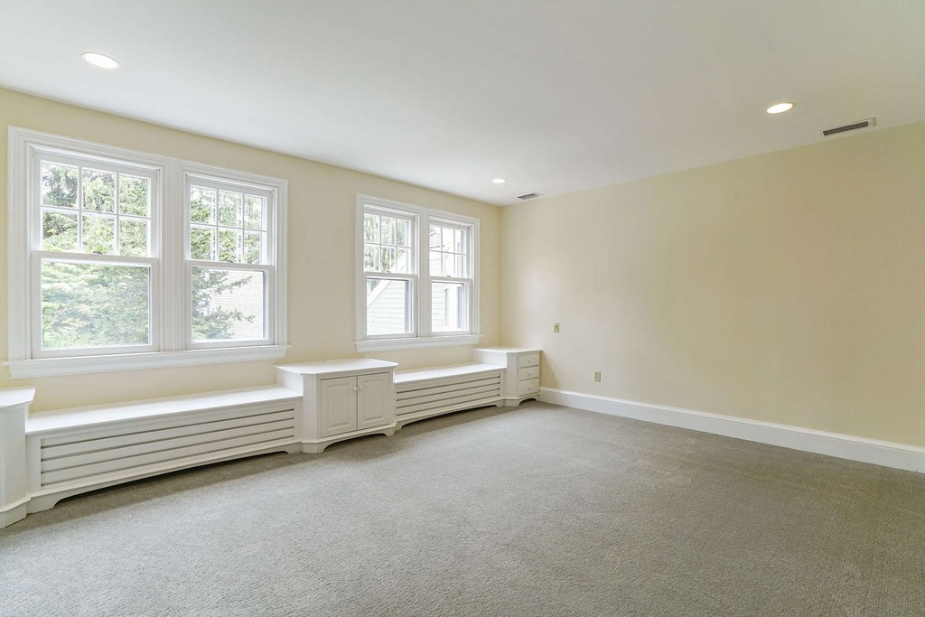2 Hampton Road Lexington, MA 02421 - Photo 25 of 30 a spacious bathroom with a bathtub and a window