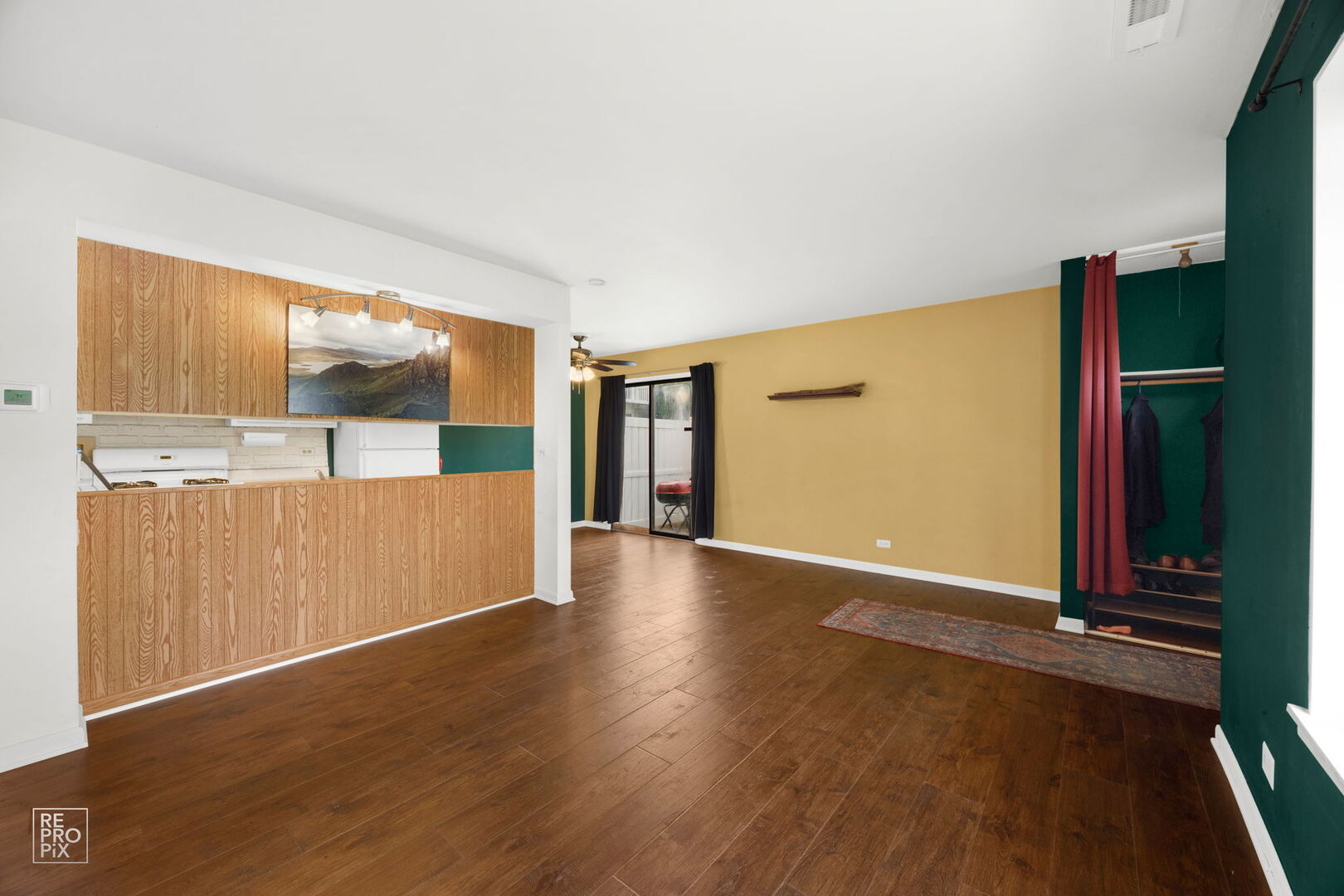 1593 Cornell Place Hoffman Estates, IL 60169 - Photo 4 of 18 a view of a hallway with wooden floor