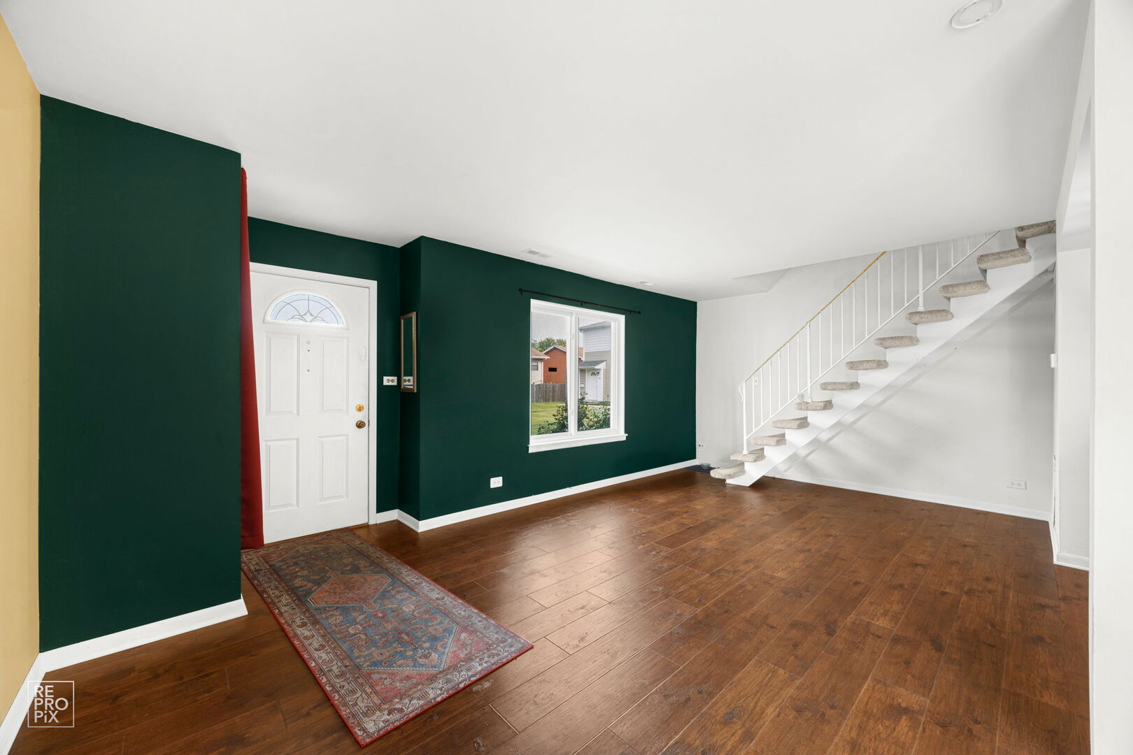 1593 Cornell Place Hoffman Estates, IL 60169 - Photo 5 of 18 an empty room with windows and closet