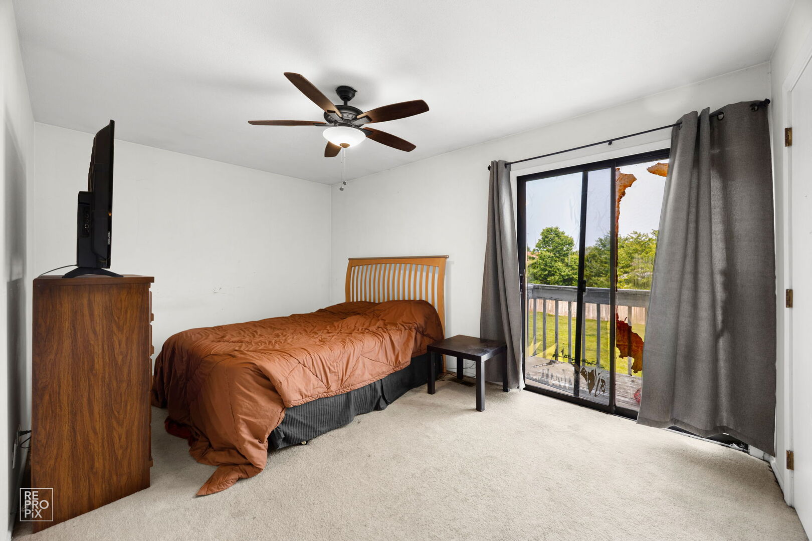 1593 Cornell Place Hoffman Estates, IL 60169 - Photo 9 of 18 a bedroom with a bed and large window