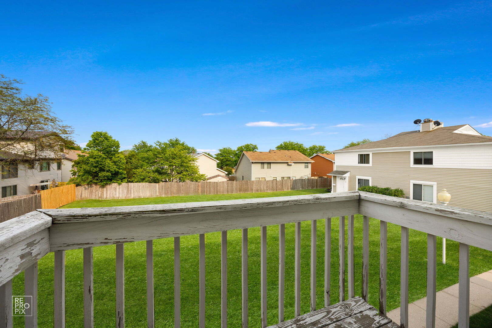 1593 Cornell Place Hoffman Estates, IL 60169 - Photo 10 of 18 a view of a building from a balcony
