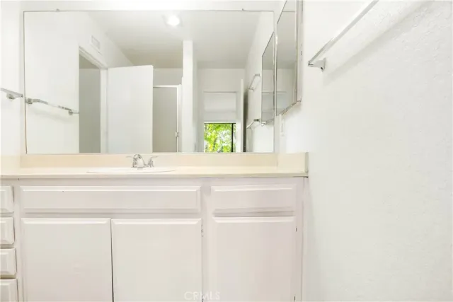 a bathroom with a shower and a toilet