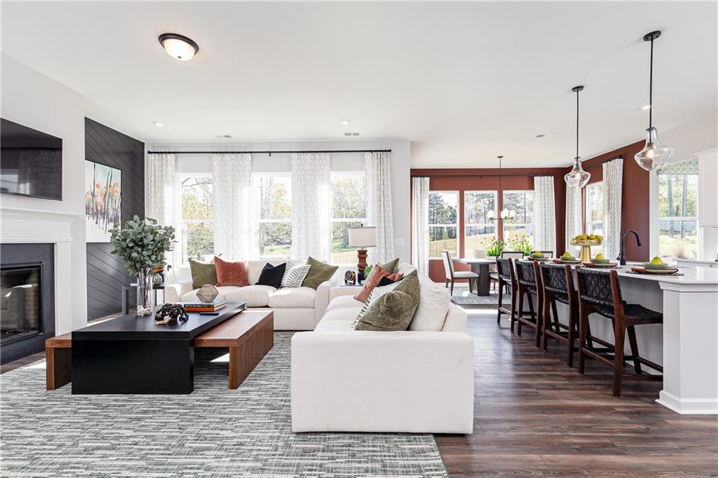 3210 Croftside Commons Powder Springs, GA 30127 - Photo 7 of 57 a living room with furniture large window and a table