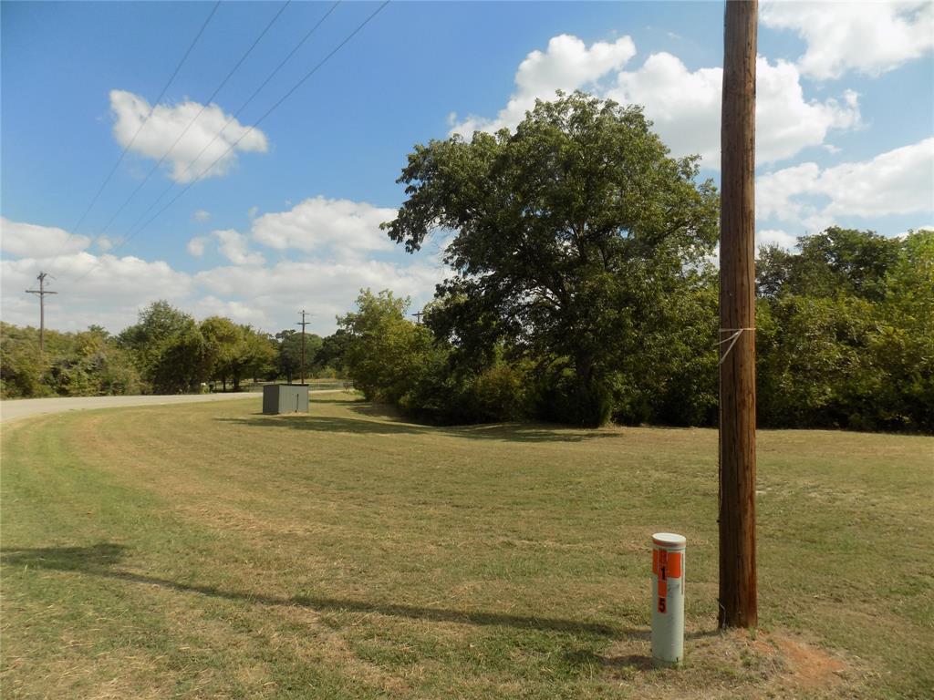 3450 Sarra Lane Springtown, TX 76082 - Photo 20 of 23 Beautiful yard view; pump house visible; large enough yard to add extra structures.