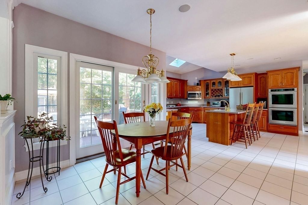 7 Riverbend Road Upton, MA 01568 - Photo 11 of 39 a dining room with furniture and window