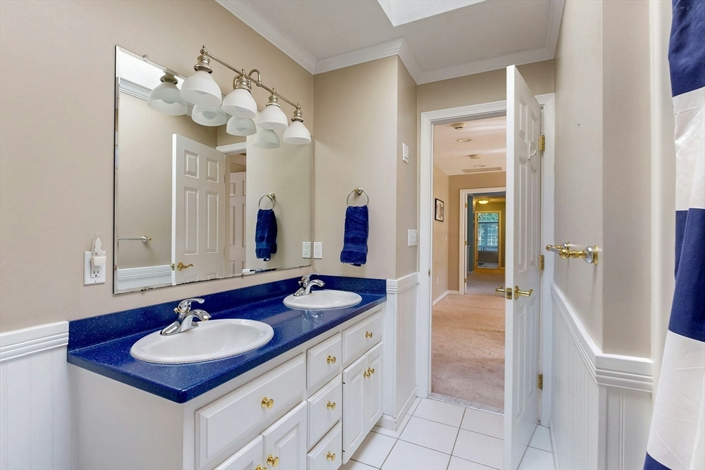 7 Riverbend Road Upton, MA 01568 - Photo 25 of 39 a bathroom with a sink and a mirror