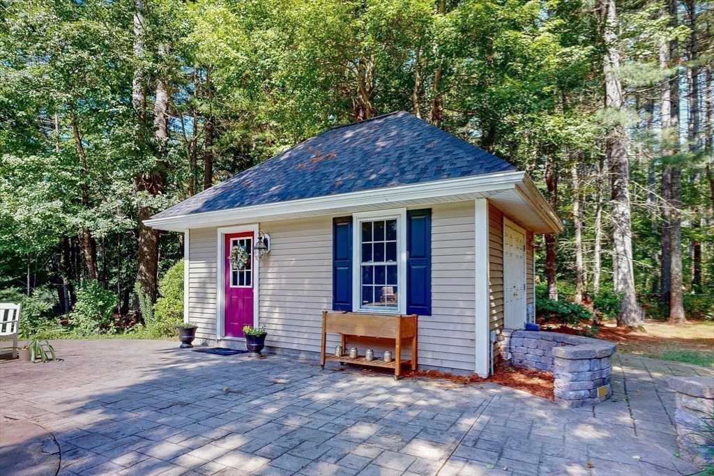 7 Riverbend Road Upton, MA 01568 - Photo 33 of 39 a view of a house that has a small yard and large trees