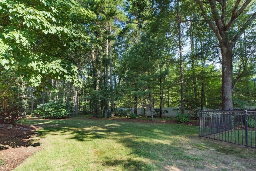 7 Riverbend Road Upton, MA 01568 - Photo 34 of 39 a view of a yard with a tree
