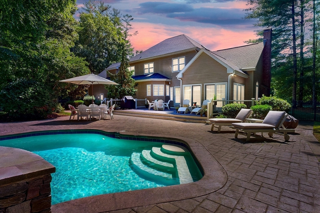 7 Riverbend Road Upton, MA 01568 - Photo 35 of 39 a swimming pool view with a seating space and a garden view