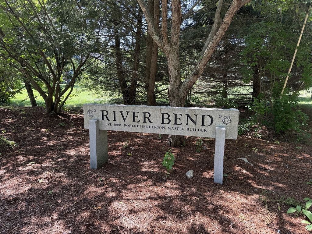 7 Riverbend Road Upton, MA 01568 - Photo 36 of 39 a sign that is sitting in the middle of a park