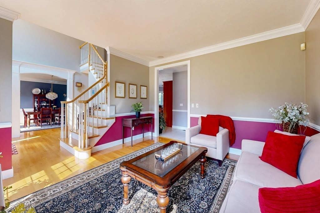 7 Riverbend Road Upton, MA 01568 - Photo 6 of 39 a living room with furniture and a rug