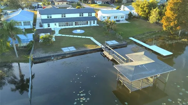 a view of a pool with a yard