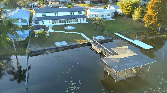 a view of a pool with a yard