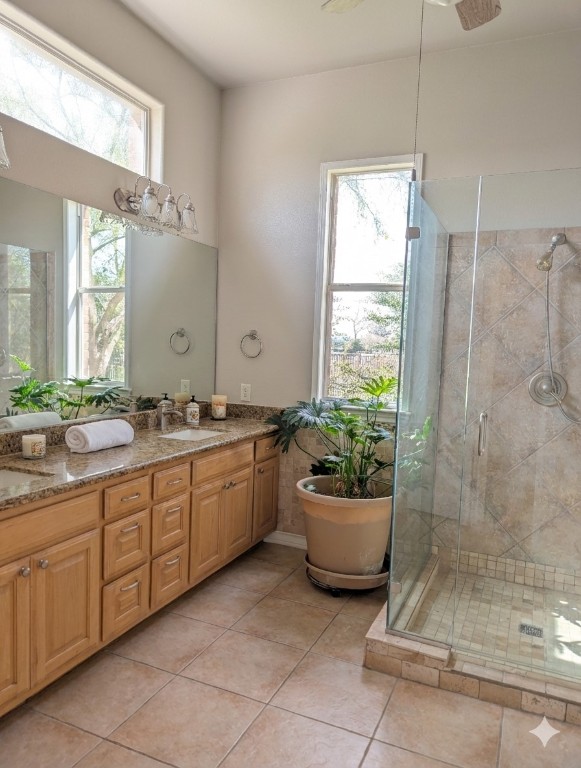 5 Anderson Crossing Cedar Park, TX 78613 - Photo 12 of 25 a bathroom with a granite countertop sink mirror and bathtub