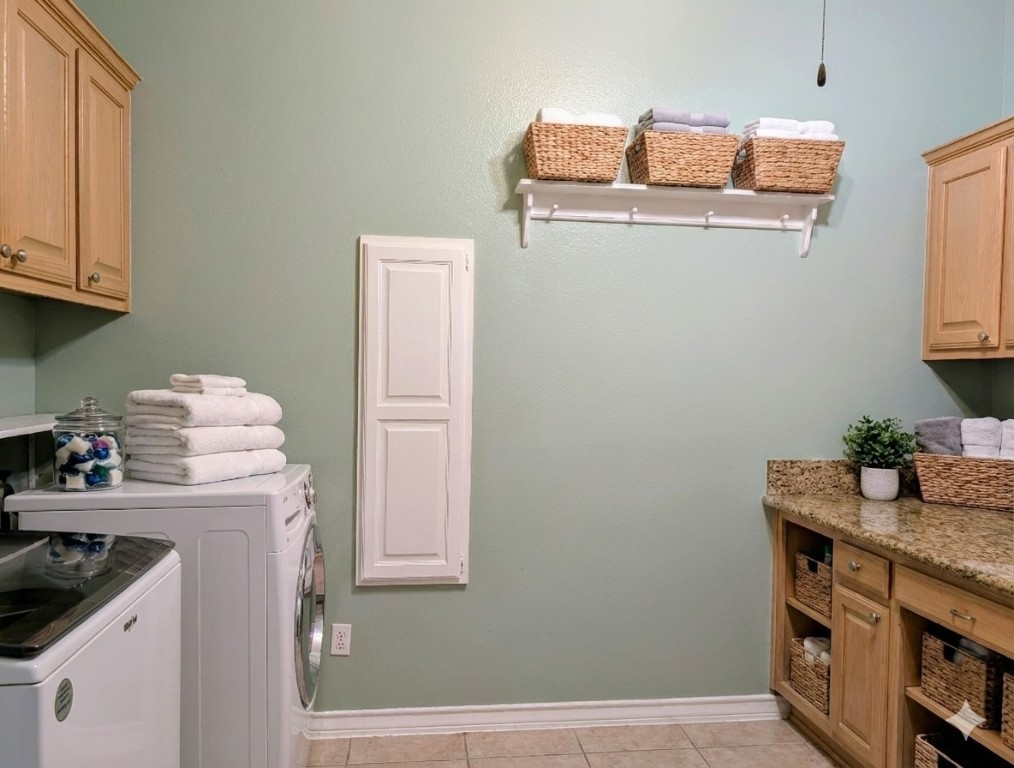 5 Anderson Crossing Cedar Park, TX 78613 - Photo 13 of 25 a kitchen with a stove and cabinets