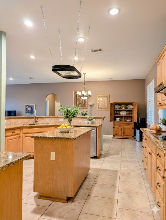 5 Anderson Crossing Cedar Park, TX 78613 - Photo 10 of 25 a kitchen with stainless steel appliances granite countertop a stove and a sink