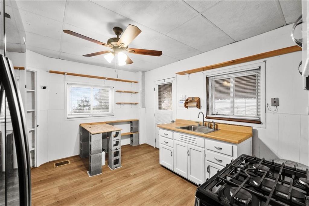 2811 Cobden Street Pittsburgh, PA 15203 - Photo 11 of 32 a kitchen with a sink appliances and cabinets